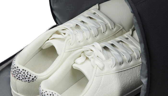 Poche latérale pour chaussures