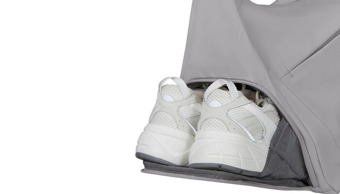 Poche latérale pour chaussures