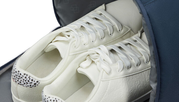 Poche latérale pour chaussures